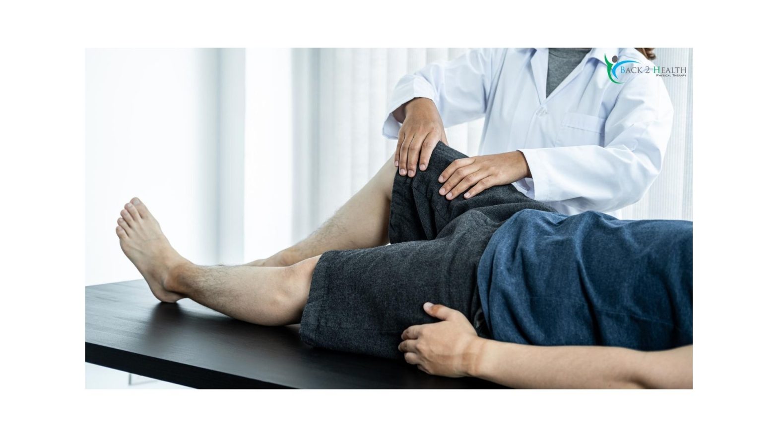 Physical therapist examining a patient’s knee during knee pain physical therapy session at Back 2 Health