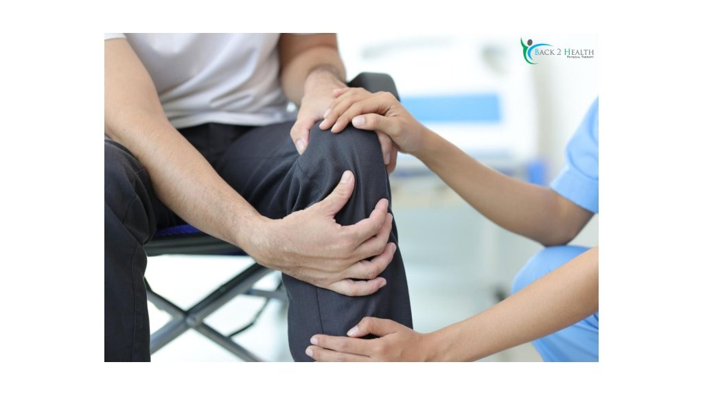 A physical therapist providing targeted physical therapy for knee pain as part of a structured total knee replacement rehab protocol.