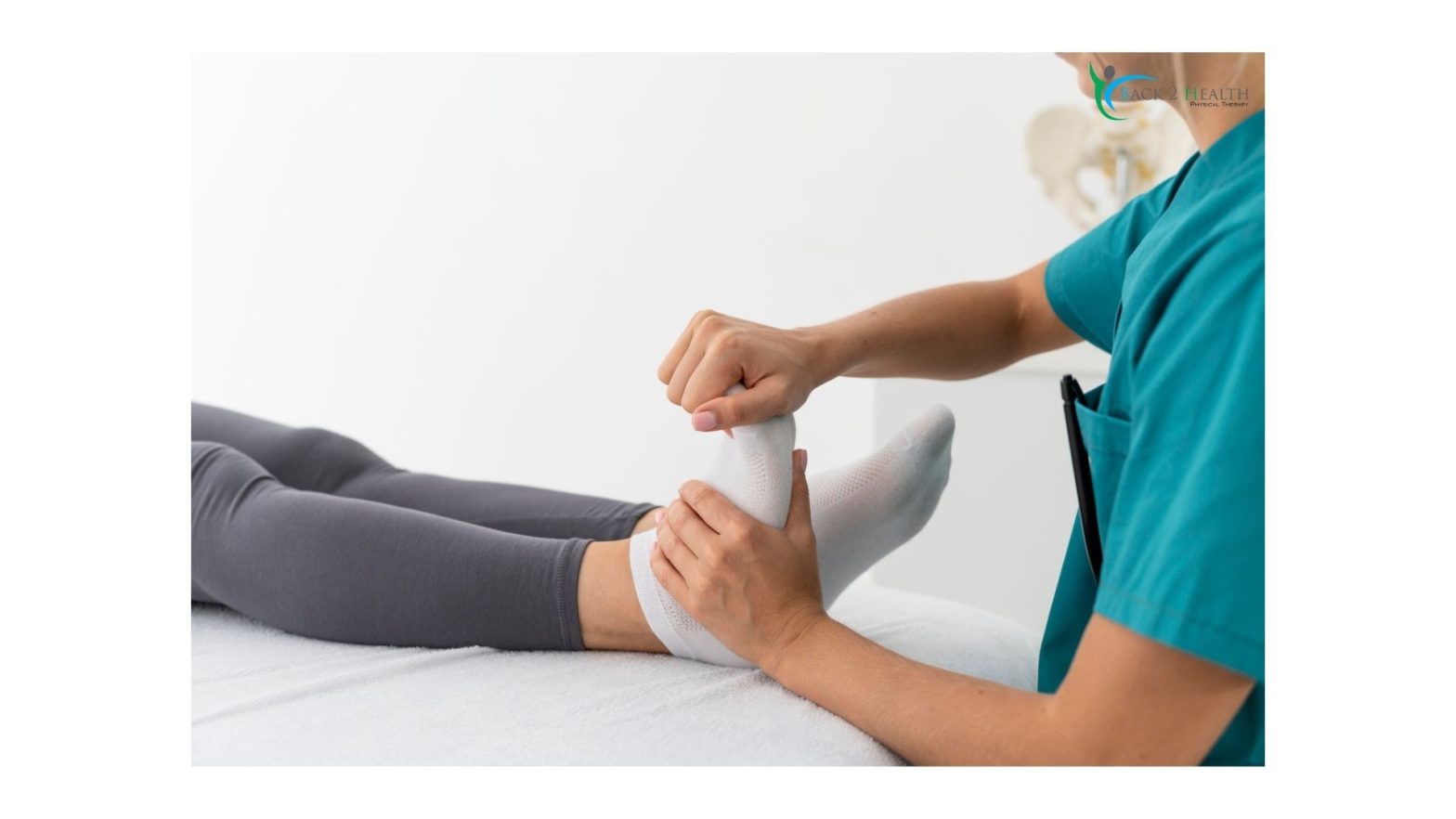 A therapist at Back 2 Health clinic providing manual physical therapy for ankle pain in Michigan to improve foot mobility and range of motion.